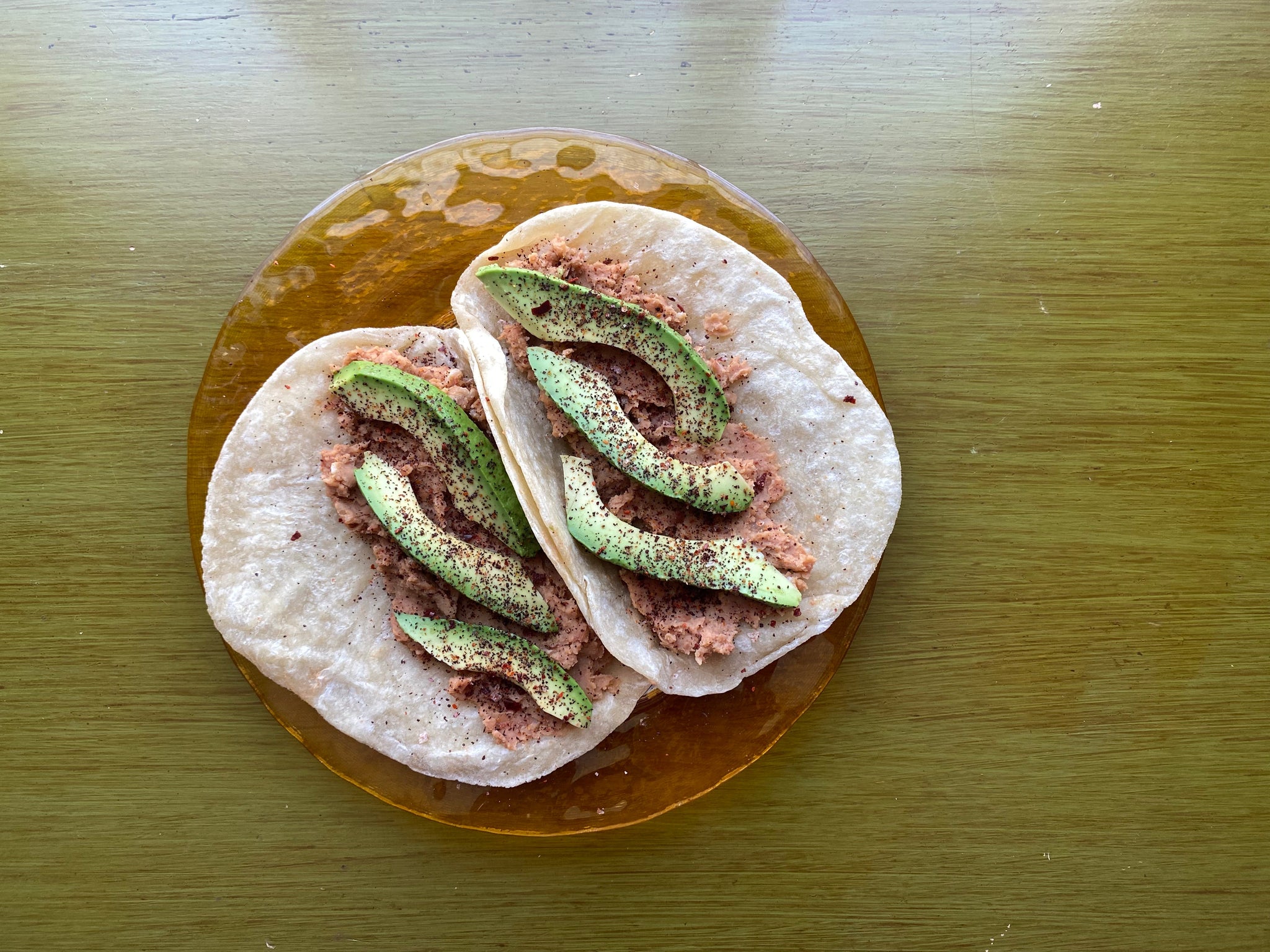 bean and avocado tacos with sugo salt
